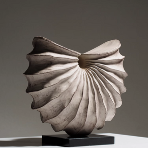 Whispering Waves Stone Shell Sculpture